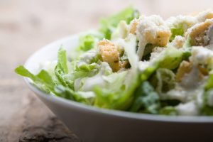 Ceasar Salad with dressing and parmesan