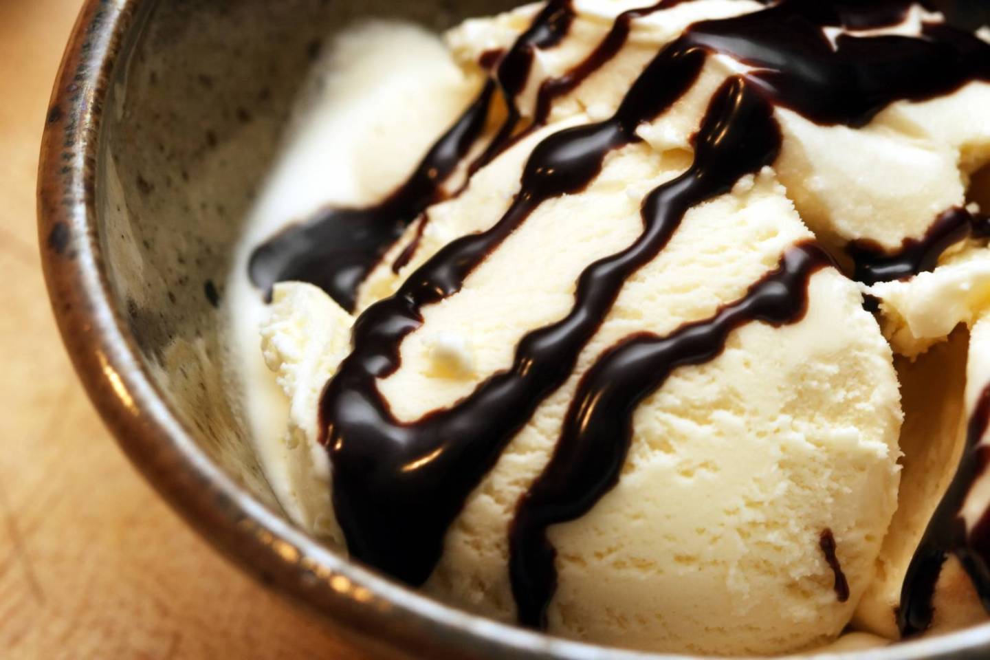 Vanilla ice cream drizzled with hot fudge