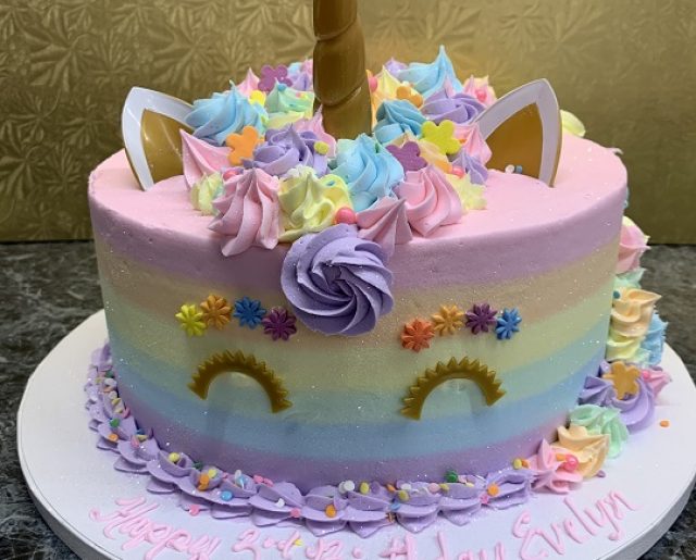 unicorn rainbow round birthday cake