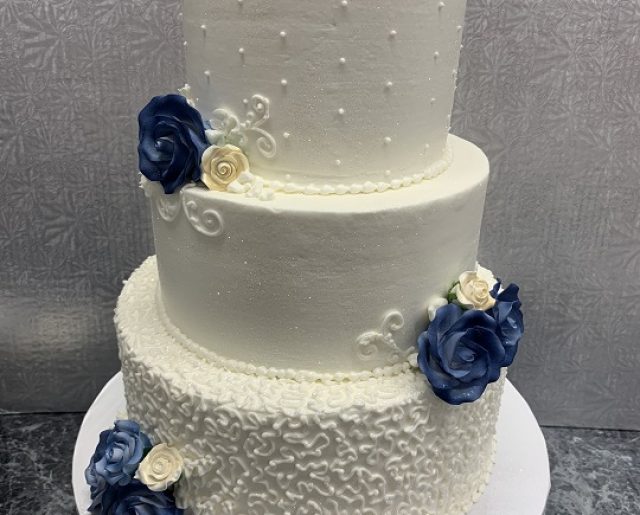 blue and white layered wedding cake