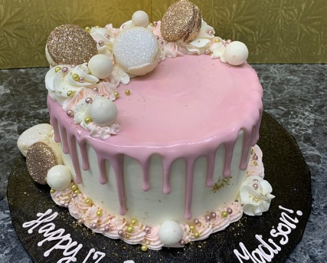 macron round birthday drip cake